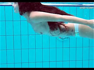 red-hot breasts and shaved vag underwater